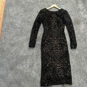 Stop you in your tracks Black Sequin Dress